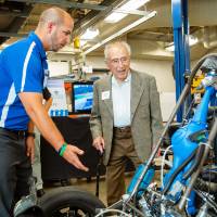 Seymour Padnos speaking with an engineering student.